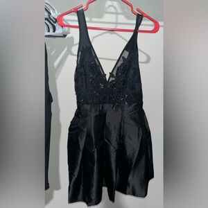 Elegant Black Sleeveless Dress with Floral Lace